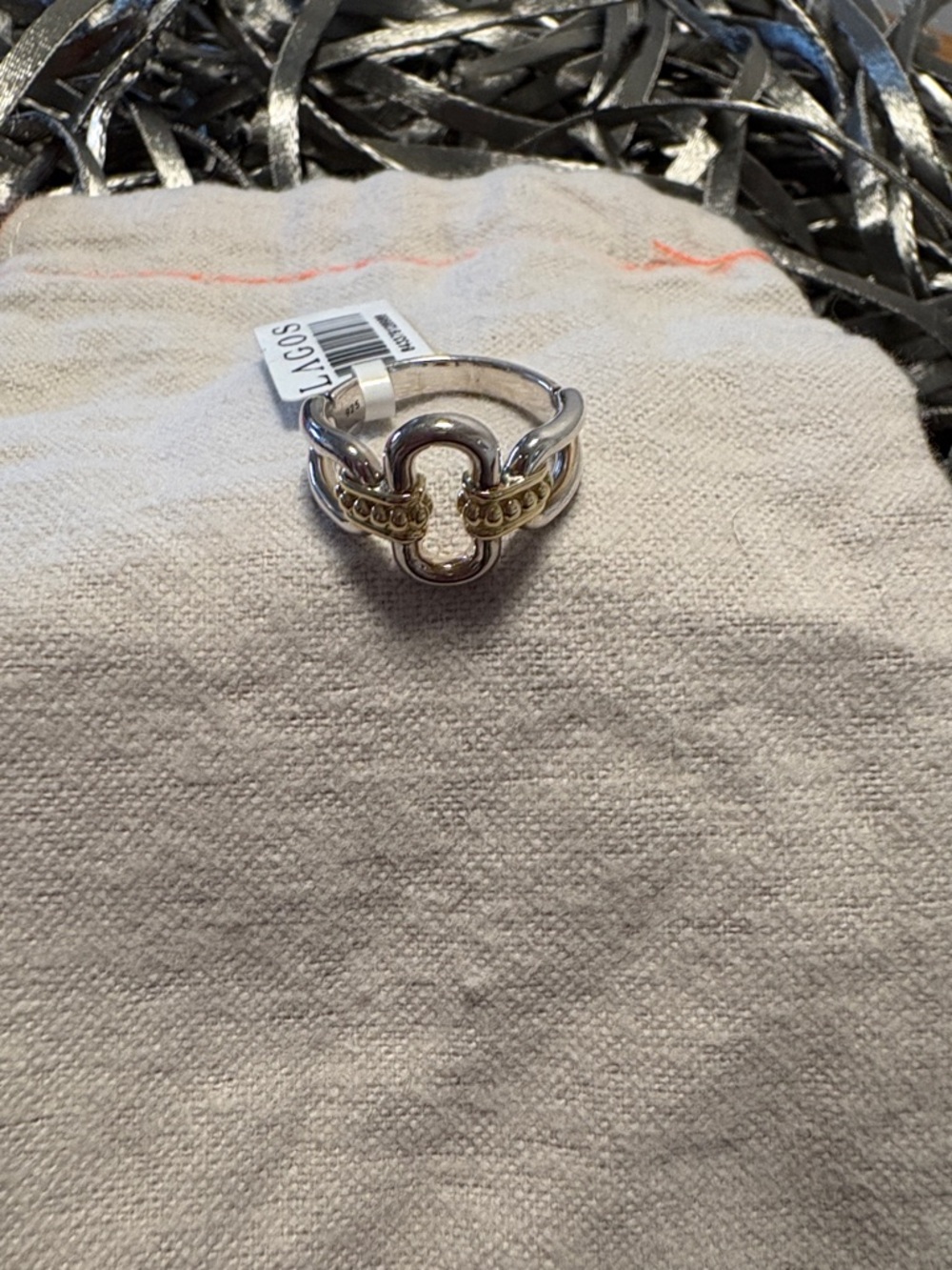 Lagos, Sterling, silver and 18k signature caviar 13 mm oval link ring.